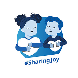 Badge featuring children holding hearts