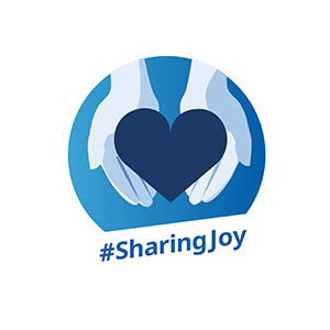 Badge featuring both hands holding a heart