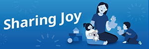 Illustration of an educator interacting with 2 young children with text 'Sharing Joy'