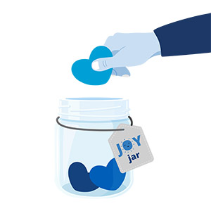 A tile featuring a Joy jar and a hand holding a heart shape pager above the jar.