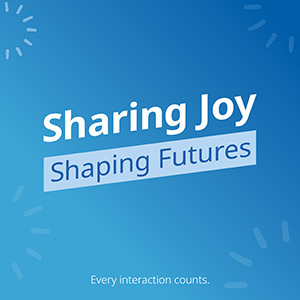 A tile featuring 'Sharing Joy, Shaping Futures. Every interaction counts.'
