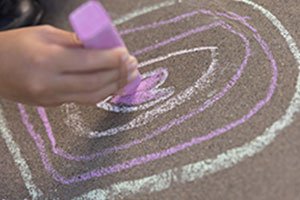 A hand drawing with chalk on the ground